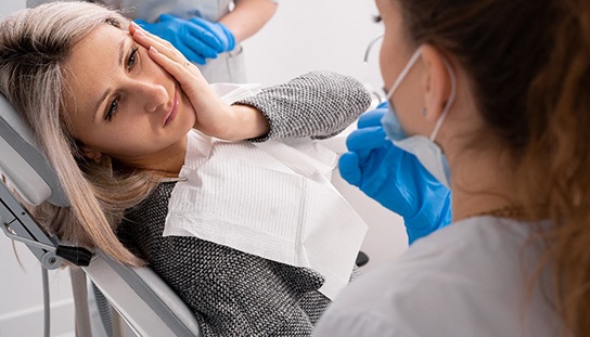 a person suffering from a toothache