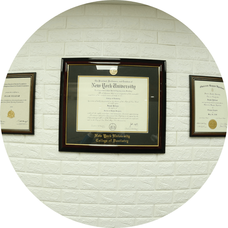 Doctor Yelizar's diplomas on orthodontic office wall