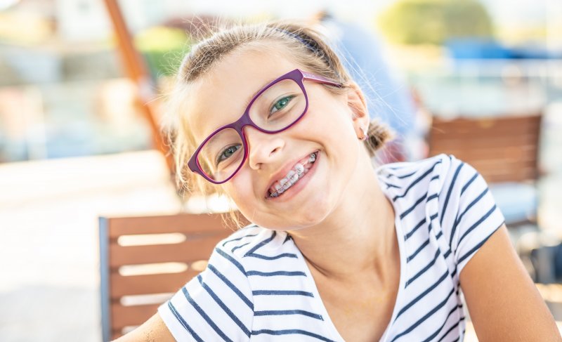 Young pre-teen girl with metal braces