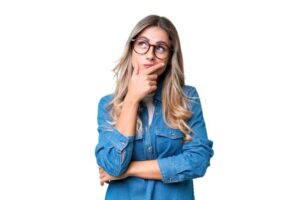 Woman wearing thoughtful, curious expression