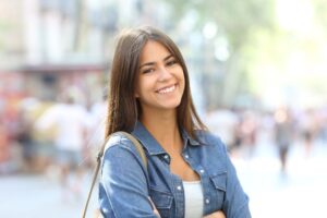 Portrait of smiling young woman with a beautiful smile